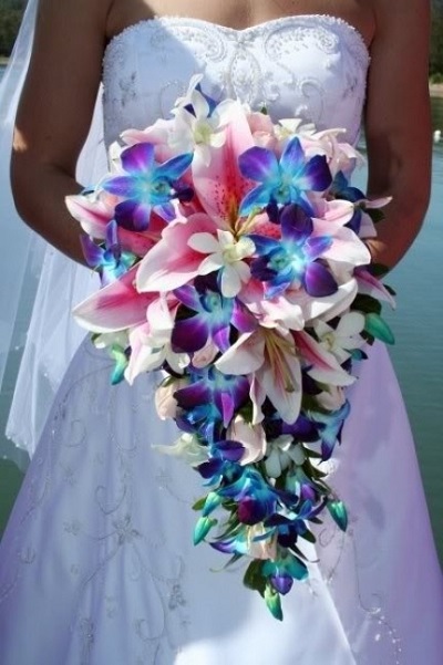 Blue orchid lily trailing floral wedding bridal bouquet trends 2014