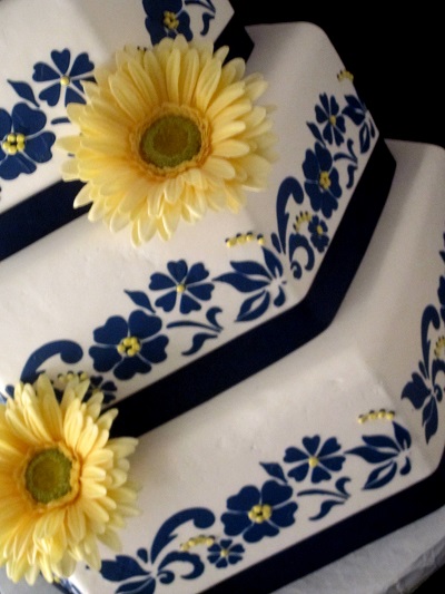 navy yellow white wedding cake