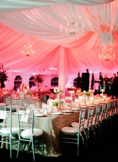 pink uplighting chandeliers wedding lighting