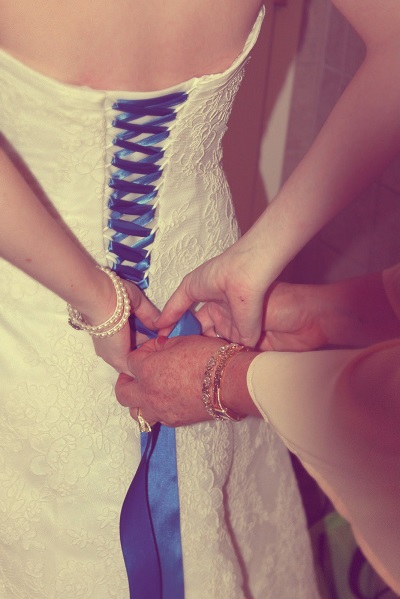 blue ribbon corset laced wedding dress