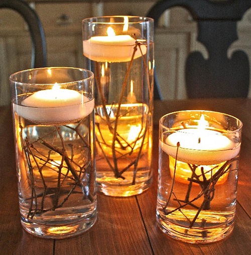 branches floating candles wedding centerpiece