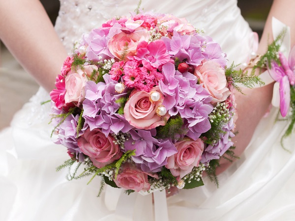 round traditional wedding bouquet